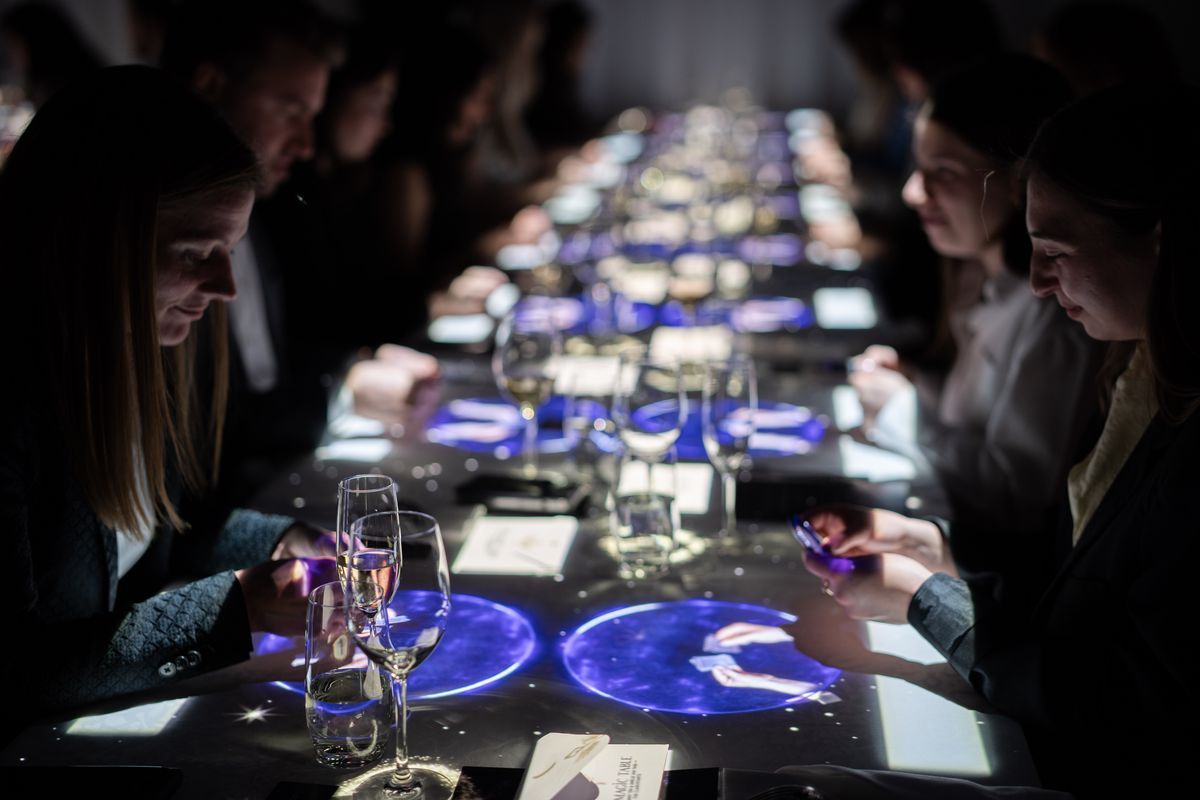 The Magic Table Bangkok — guests discovering impossible magic at the Grand Hyatt Erawan dinner table